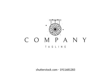 Vector logo in which an abstract image of a dreamcatcher pattern on a background of stars.