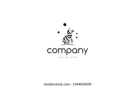 Vector logo which depicts a funny zebra with a raised leg.