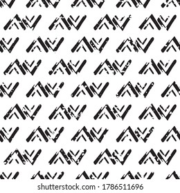 Vector loose tribal zig zag grunge seamless pattern background. Painterly brush stroke chevrons ethnic black and white backdrop. Geometric design. All over print for packaging, stationery.