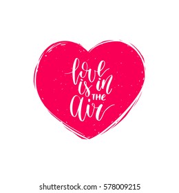 Vector Love Is In The Air inscription in heart shape. Valentine's day hand lettering card, poster etc. February 14 modern calligraphy illustration on romantic background. 