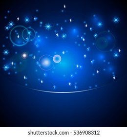 Vector magic bokeh lights with stars, snow, lens flare effect and sparkles on blue background with copy space for your text.