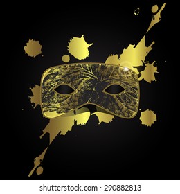 Vector magic gold mask with black pattern on black background with golden splash