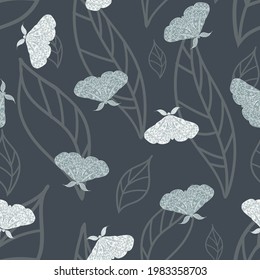 Vector Magical Moths on Dark Leaves seamless pattern background.