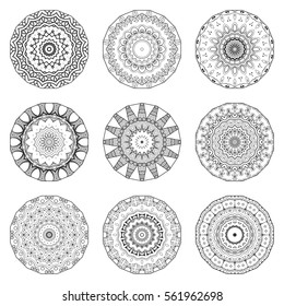 Vector Mandala patterns set. Black round ornaments collection on a white background, isolated sketch design elements. Doodle art for coloring book. Tribal ethnic indian meditation motif