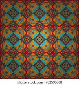 Vector mandala seamless pattern card in yellow, blue and orange colors for backgrounds, invitations, birthday cards, wallpapers and etc.