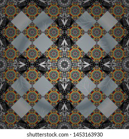 Vector mandalas in gray, yellow and blue colors. Template for textile, carpet, wallpaper, fabric. Abstract filigree seamless pattern.