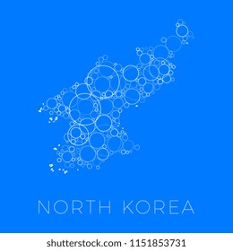 vector map of north korea filled with white circles of different sizes and degrees of transparency on blue background