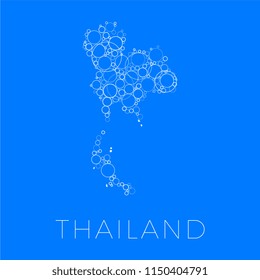 vector map of thailand filled with white circles of different sizes and degrees of transparency on blue background