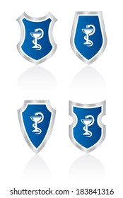 Vector medic shields with caduceus symbol.