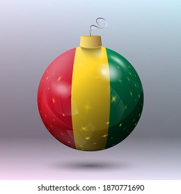 Vector - Merry Christmas ball with Guinea flag
