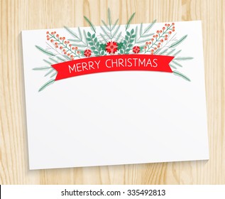 Vector Merry christmas greeting card with banner. Blank sheet of paper set on a wood texture background. Pattern of floral frozen elements  tree branch, fir, twig and berries.