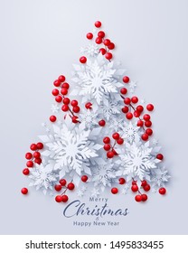 Vector Merry Christmas and Happy New Year background with realistic looking paper cut 3d snowflakes and red holly berries decoration in Christmas tree shape. Seasonal holidays banner