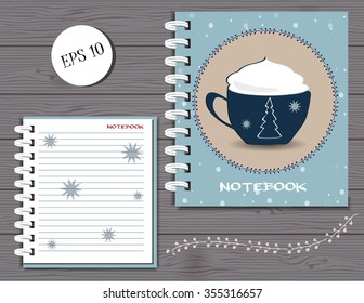 Vector Merry Christmas and Happy New Year spiral notebook design.Christmas eve lettering.celebrative template .Festive illustration of cappuccino coffee cup in frame with snow and stars.note mock up