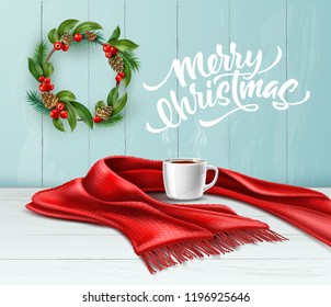 Vector merry christmas lettering poster design with christmas wreath on wooden wall, red knitted scarf with cup of hot coffee, tea at white table. Xmas, new year winter holiday greeting card, banner