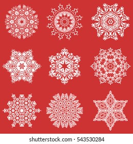 Vector Merry Christmas set of nine snowflakes on a orange background.