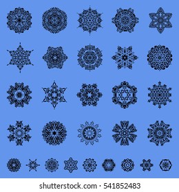 Vector Merry Christmas set of twenty nine snowflakes on a blue background.