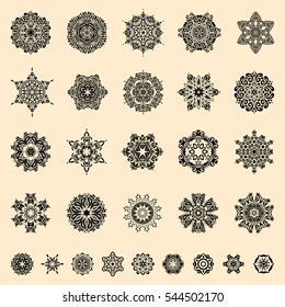 Vector Merry Christmas set of twenty nine snowflakes on a beige background.