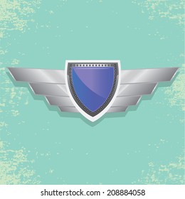Vector metallic automotive, motorcycle badge with wings. Signs and labels.