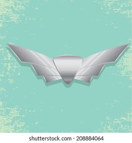 Vector metallic automotive, motorcycle badge with wings. Signs and labels.