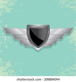 Vector metallic automotive, motorcycle badge with wings. Signs and labels.