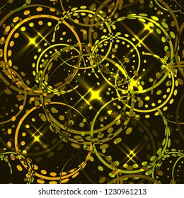 Vector metallic stars and rings in sunny hues on a sparkling background. Seamless pattern for decoration of fashion and beauty industry products.