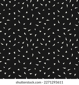 Vector minimalist geometric texture with small scattered triangles, tiny shapes. Abstract modern seamless pattern. Simple minimal black and white background. Repeat design for decor, print, wallpaper