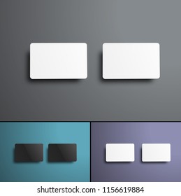 Vector Mockup  of two gift or bank cards top view. Realistic template with shadows of black and white color isolated with no background.