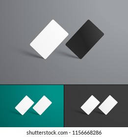 Vector Mockup  of two gift or bank cards standing on the corner. Templates of black and white forms isolated with no background.