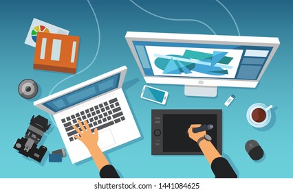 Vector of modern creative office work space of a graphic designer, image retoucher professional working on tablet and desktop