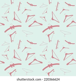 Vector modern different clothes hangers silhouettes seamless pattern on bright blue background | Wrapping paper clothes hangers seamless design
