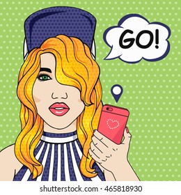 Vector modern girl with mobile phone in hand playing catch monsters game. Woman with phone and word bubble GO!