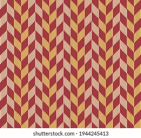 Vector modern herringbone or chevron pattern from small line shapes with red and golden color seamless background. Use for fabric, textile, cover, wrapping, decoration elements.