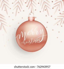 Vector modern Merry christmas card with lettering. Pink gold metal ball. Light background with a fir branches and confetti