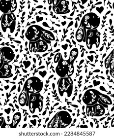 Vector monochrome seamless pattern with decorated bunnies and flowers. Nursery texture with black folk art rabbits. Childish backdrop with silhouette ornamental hares for nursery fabric and wallpaper