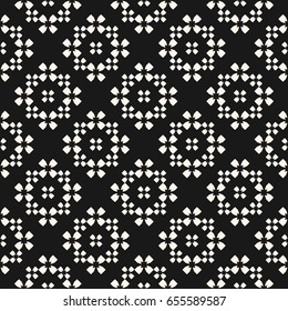 Vector monochrome seamless pattern, floral geometric background with quatrefoil flower silhouettes. Simple dark abstract texture, repeat tiles. Stylish design element for decor, fabric, prints, covers