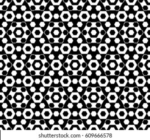 Vector monochrome texture, black & white hexagonal geometric seamless pattern. Stylish abstract background with different sized hexagons, symmetric structure. Design for textile, cover, wrapping, web