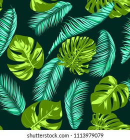 Vector Monstera and Palm Leaves. Fresh Tropical Seamless Pattern. Beautiful Exotic Summer Background. Green and Blue Jungle Foliage on a Blue Background. Vector Philodendron and Palm Leaf for Textile.