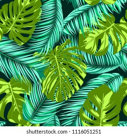 Vector Monstera and Palm Leaves. Fresh Tropical Seamless Pattern. Beautiful Exotic Summer Background. Green and Blue Jungle Foliage on a Blue Background. Vector Philodendron and Palm Leaf for Textile.
