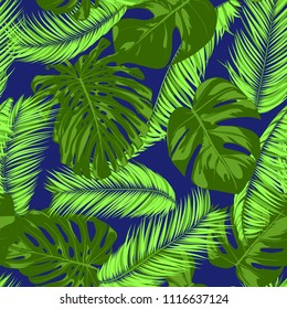 Vector Monstera and Palm Leaves. Tropical Seamless Pattern. Exotic Summer Background. Green Jungle Foliage on a Blue Background. Vector Philodendron and Palm Leaves for Print, Cloth Design, Textile.