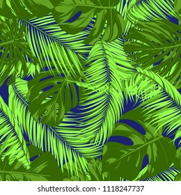 Vector Monstera and Palm Leaves. Tropical Seamless Pattern. Exotic Summer Background. Green Jungle Foliage on a Blue Background. Vector Philodendron and Palm Leaves for Print, Cloth Design, Textile.