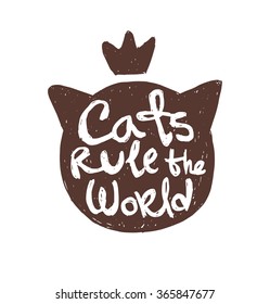 Vector motivational card with cartoon image of black silhouette of a cat's head with crown with white lettering "Cats rule the world" on a white background. Hand drawn typography poster. Quote, phrase