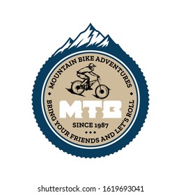 Vector mountain biking badge, logo, label with rider on a bike and mountain silhouette. Downhill, enduro, cross-country biking illustration