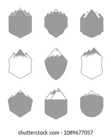Vector mountains blank badges isolated on white. Tourism and travel labels.
