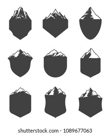Vector mountains blank badges isolated on white. Tourism and travel labels.