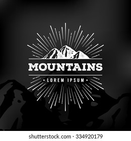 Vector mountains emblem. Outdoor activity symbol.