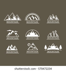 Iconos de montañas vectoriales aislados en blanco