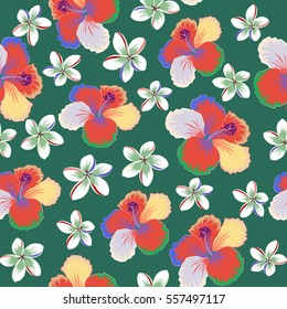 Vector multicolor hibiscus flower with leaves and buds. Seamless pattern on green background.
