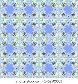 Vector multicolored branches with flowers. Vector illustration. Small flowers seamless pattern in blue, yellow and beige colors.