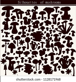 Vector mushroom silhouettes set with autumn leaves