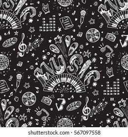 Vector Music background. Seamless pattern with Hand drawn doodle Word Music and Musical Symbols.
